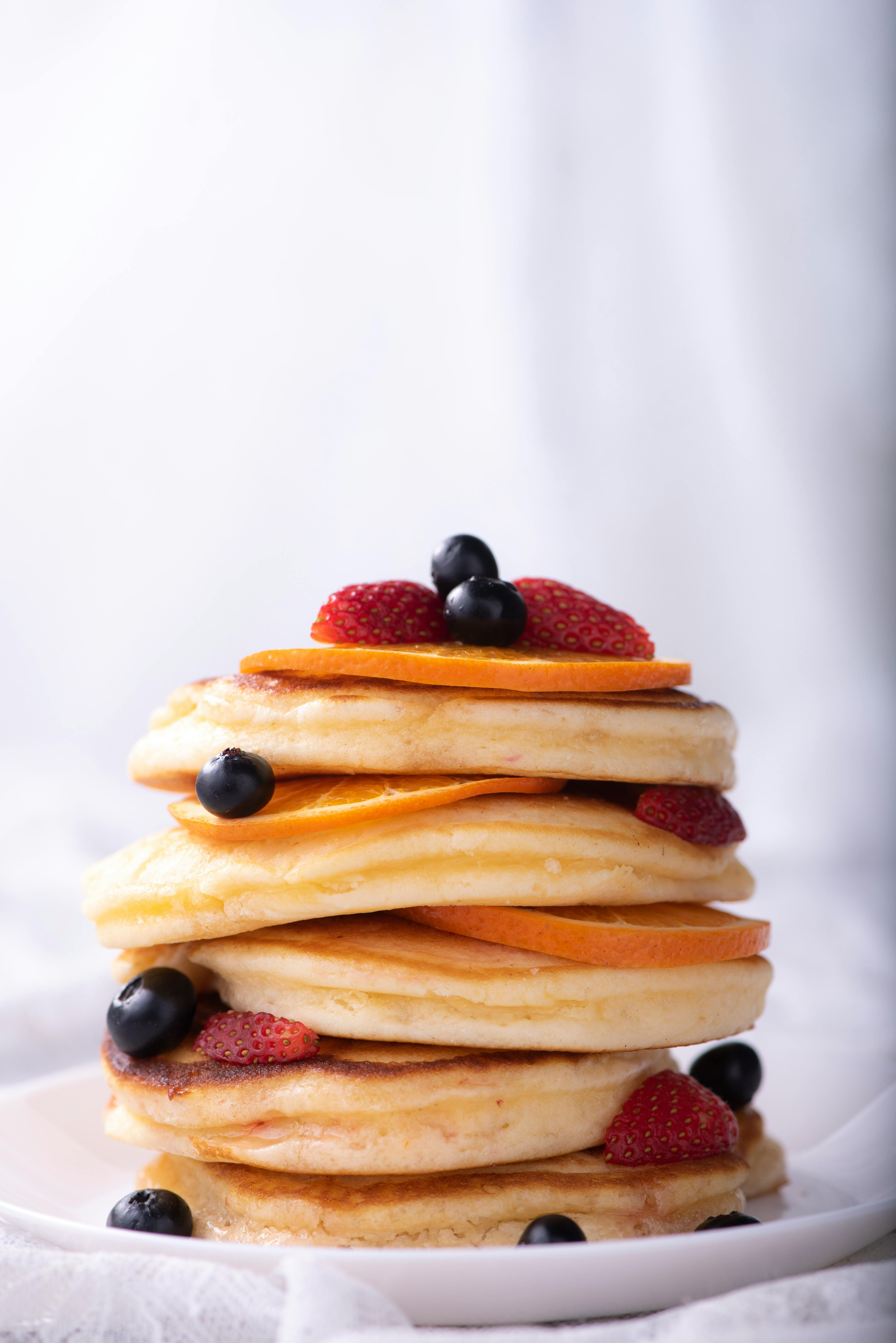 Stack of Pancakes Topped with Fresh Fruit