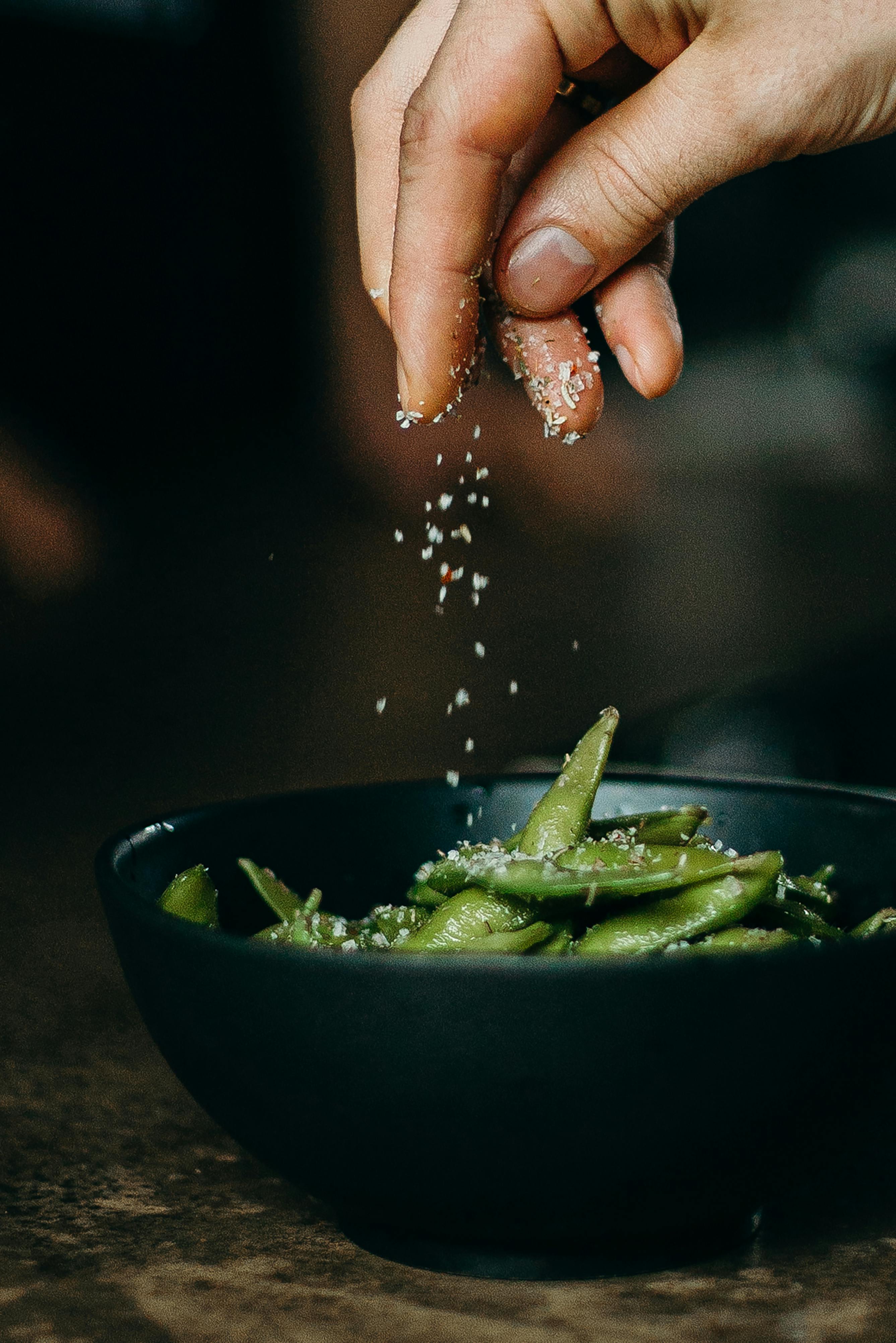 Sprinkling Salt on Edamame