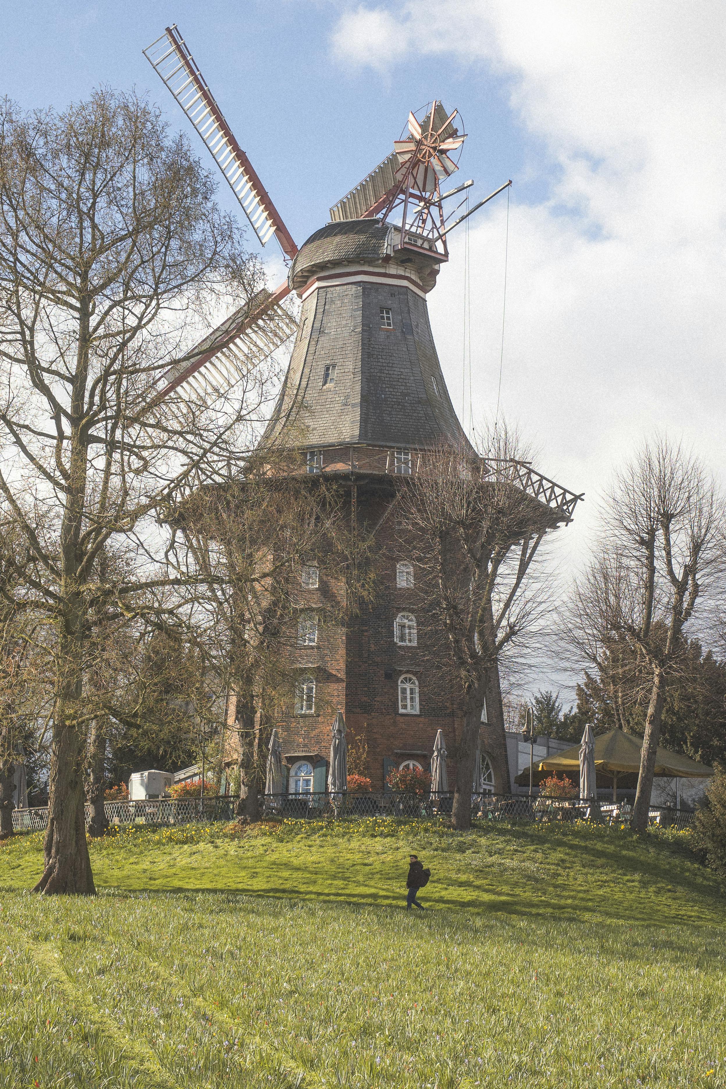 Traditional Brick Windmill on Grassy Hill