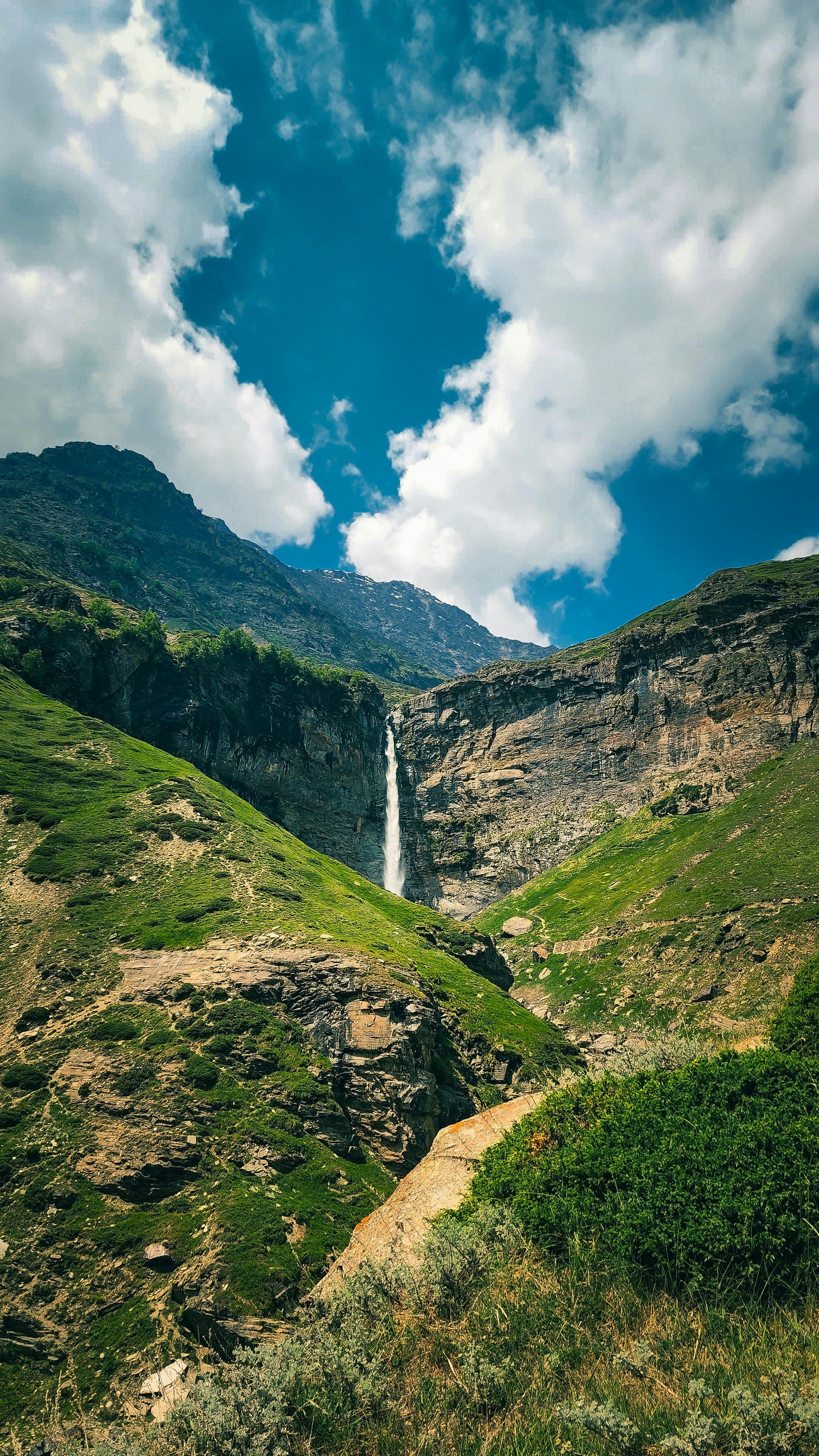 Waterfall in Mountain Valley