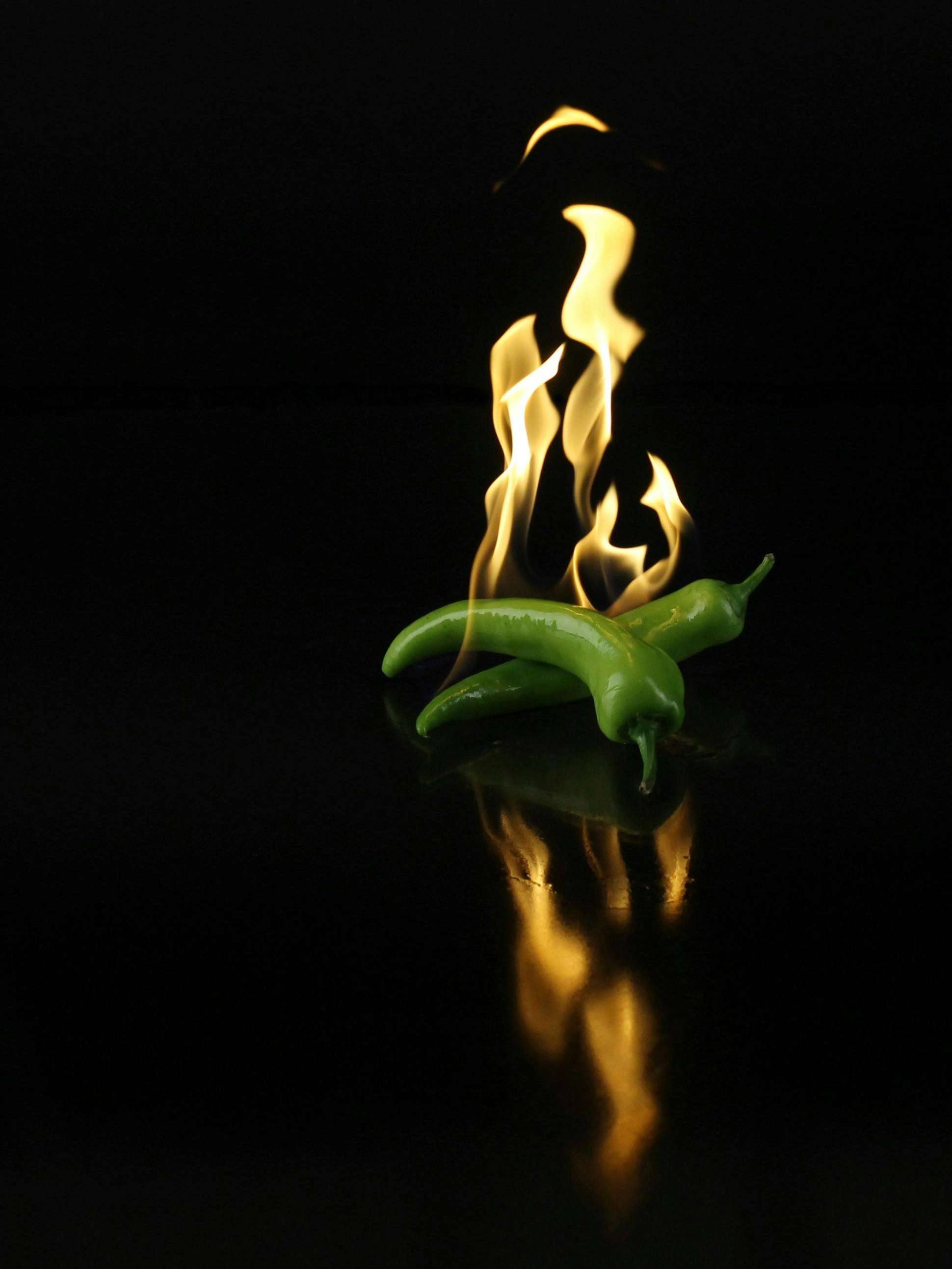 Green Chilies with Burning Flames — Food
