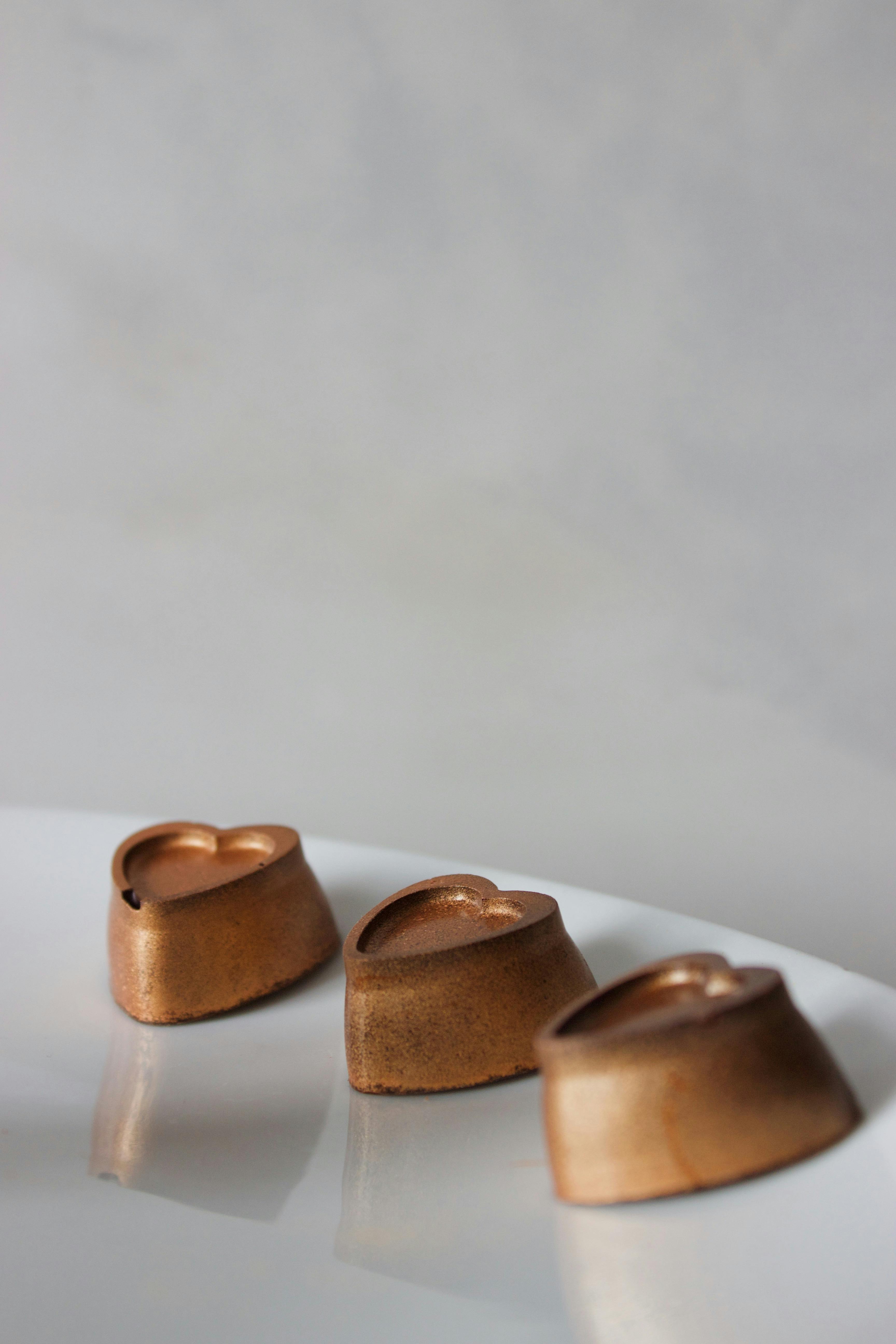 Three Heart-shaped Bronze Candle Holders