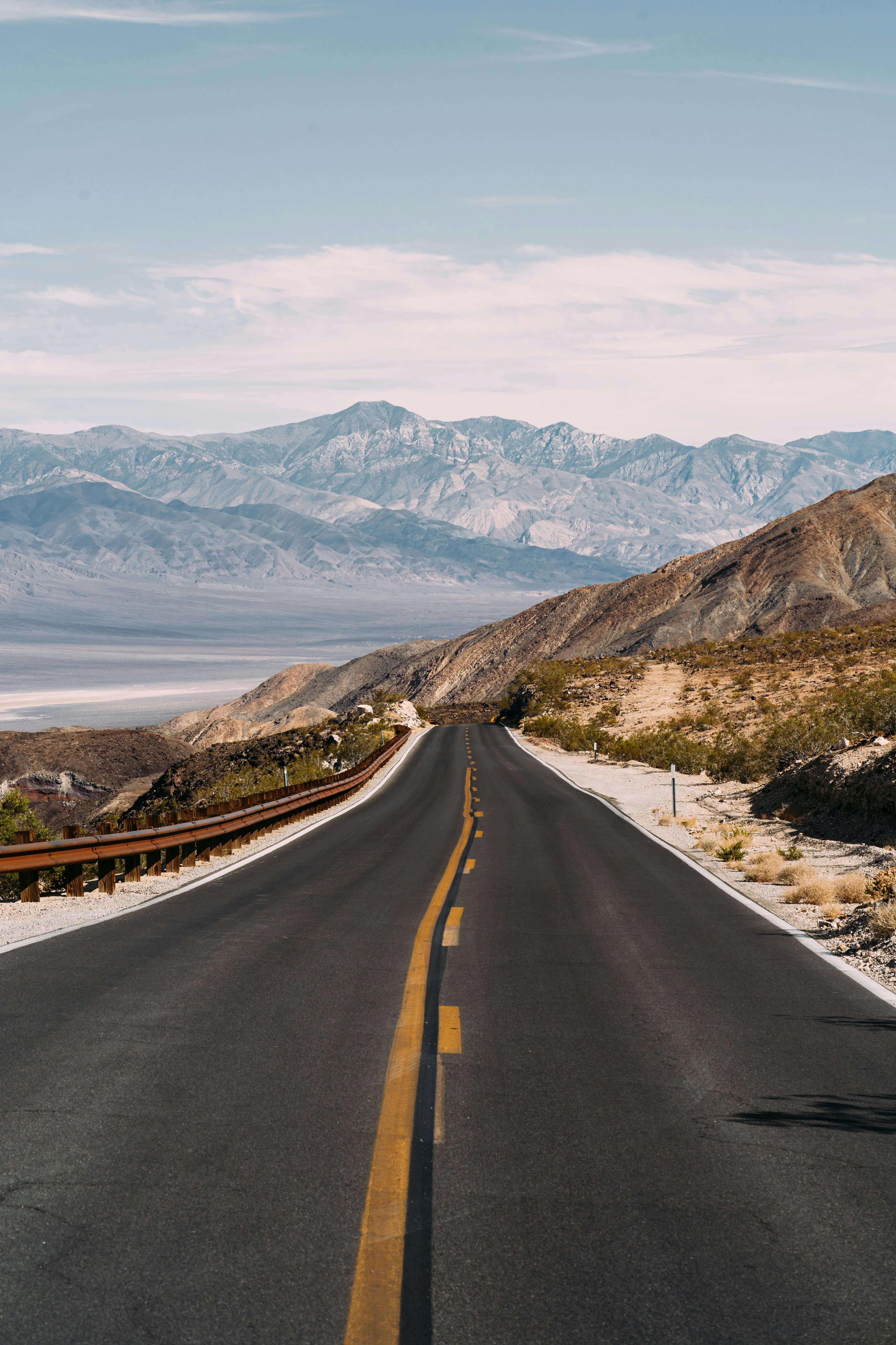 Desert Highway Leading to Distant Mountains