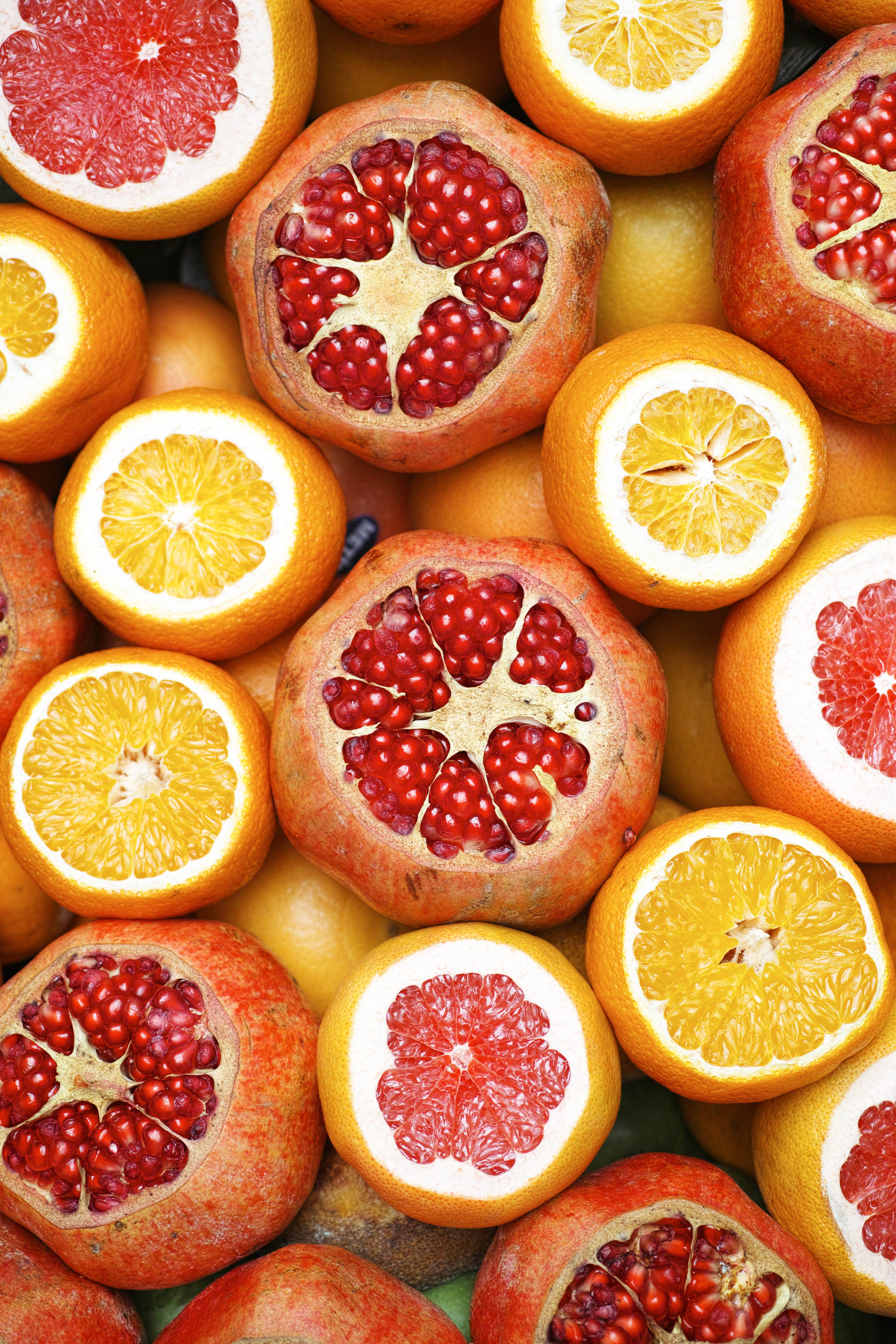 Assorted Cut Citrus and Pomegranates — Food