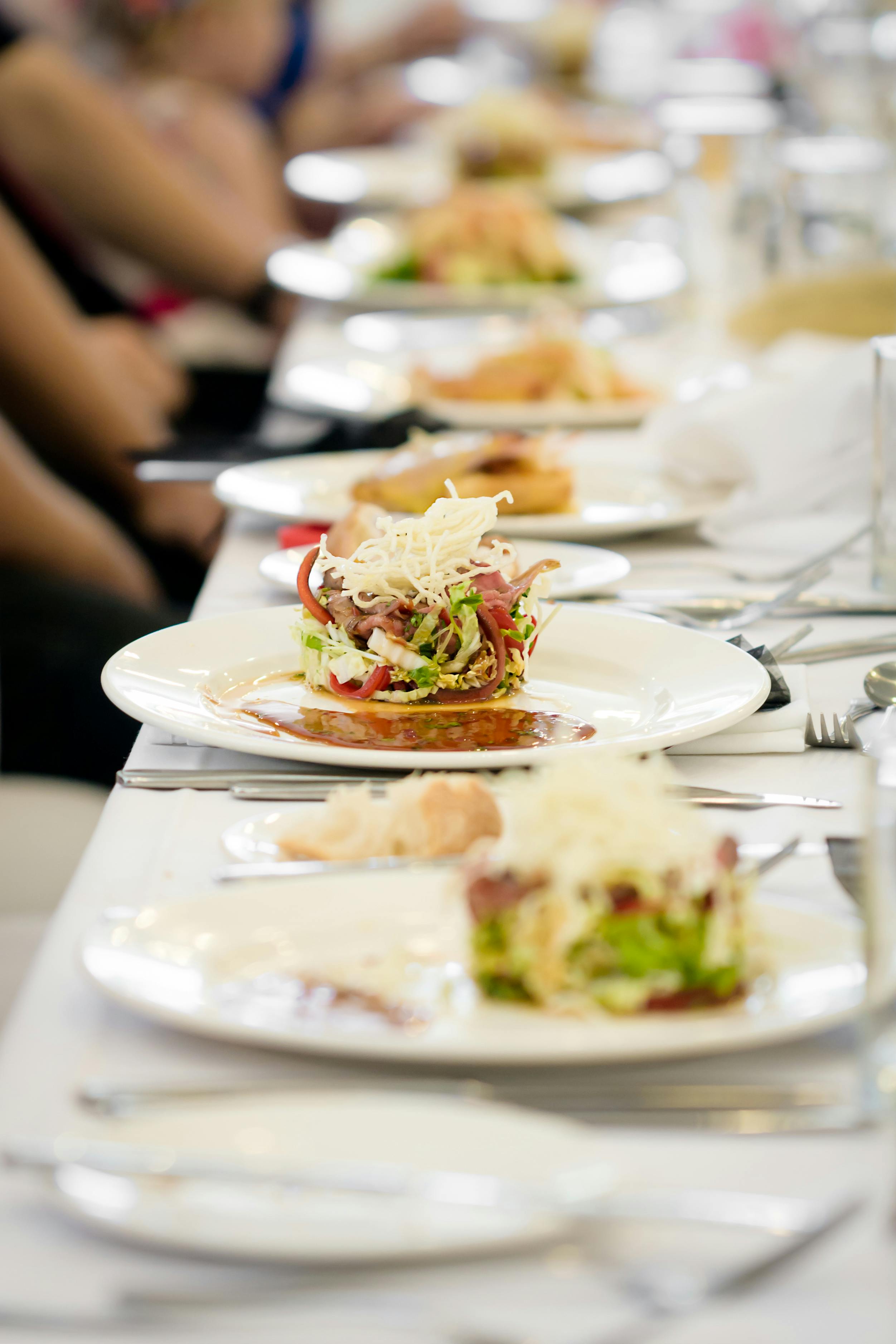 Plated Appetizers on Long Dining Table
