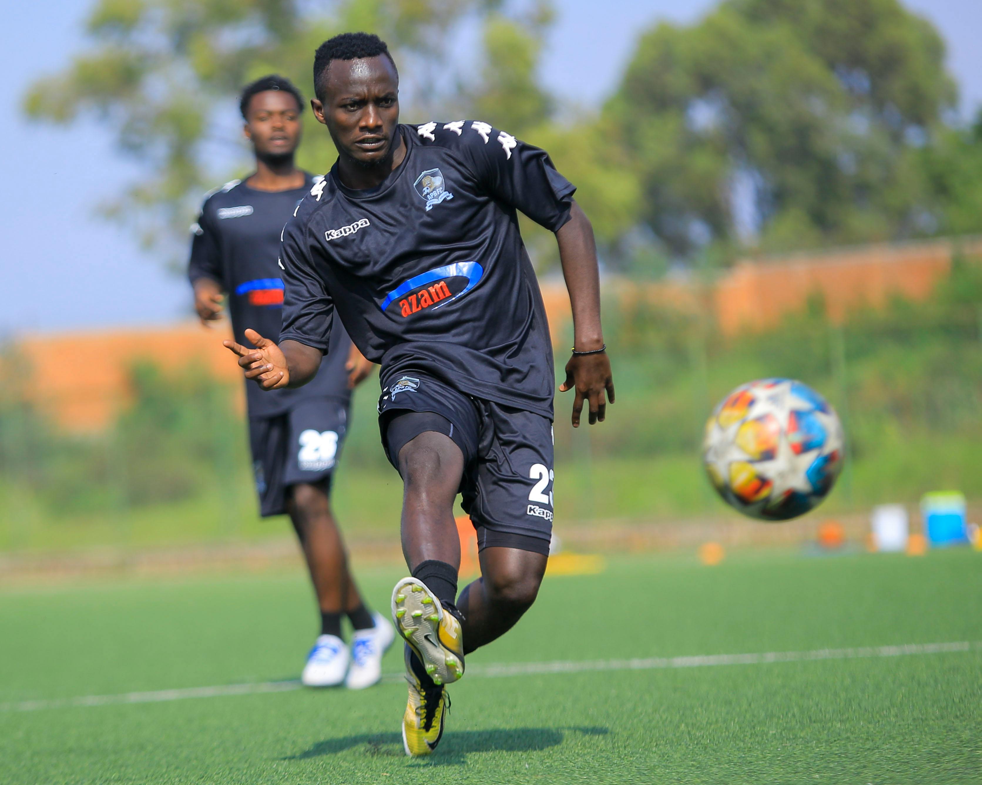 Soccer Player Training on Field