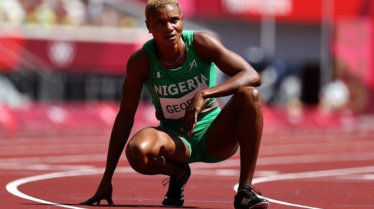 Nigerian Sprinter Crouching on Running Track