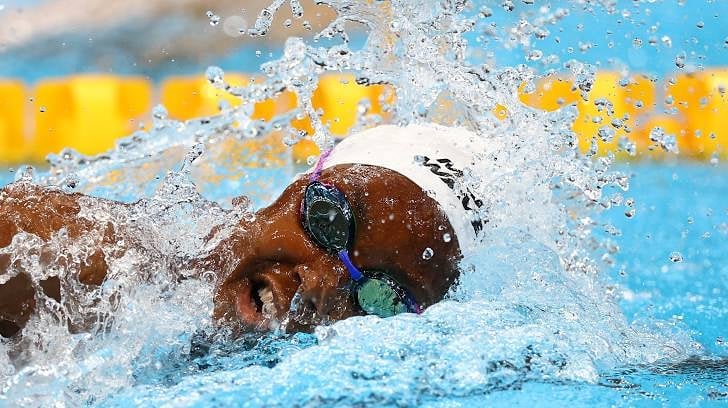 Competitive Swimmer Racing In Pool
