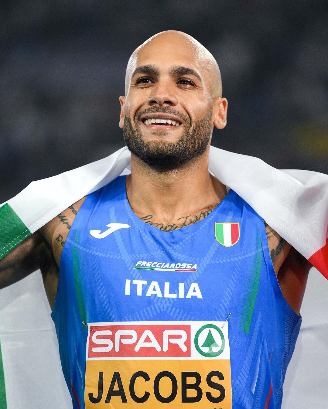 Lamont Jacobs Celebrates With Italian Flag