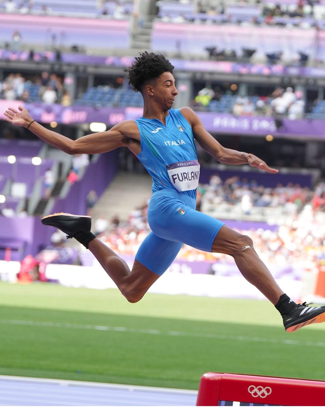 Italian Athlete Furlani Hurdling at Paris Olympics