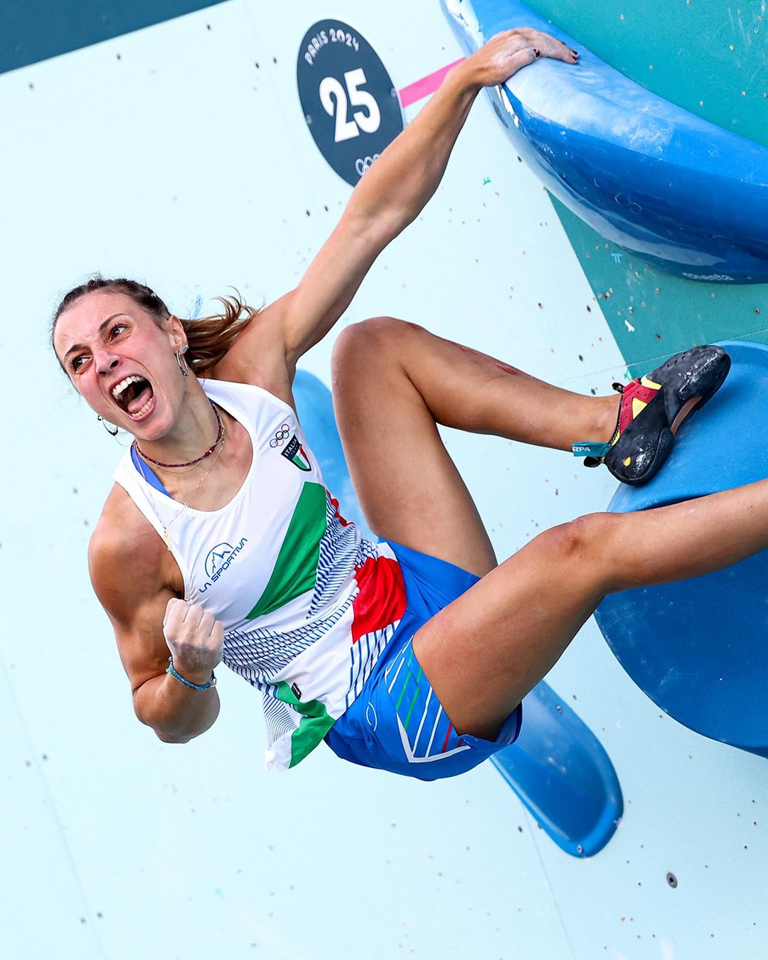 Female Climber Celebrates at Paris Olympics — People