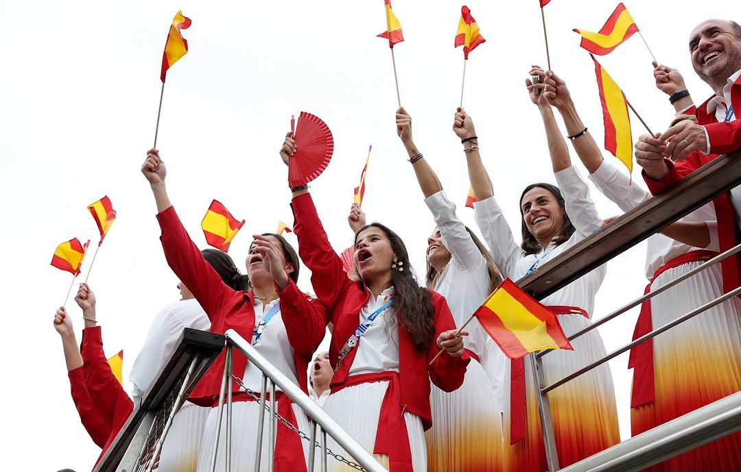 Spanish Delegation Cheering with National Flags