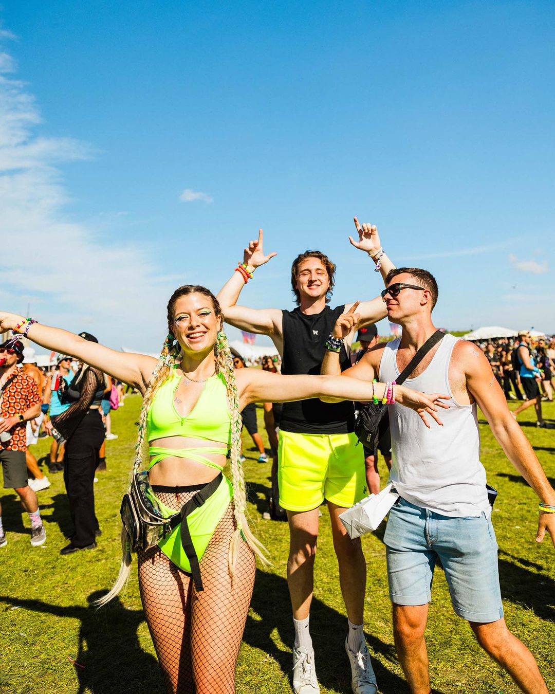 Three Friends Having Fun At Outdoor Festival