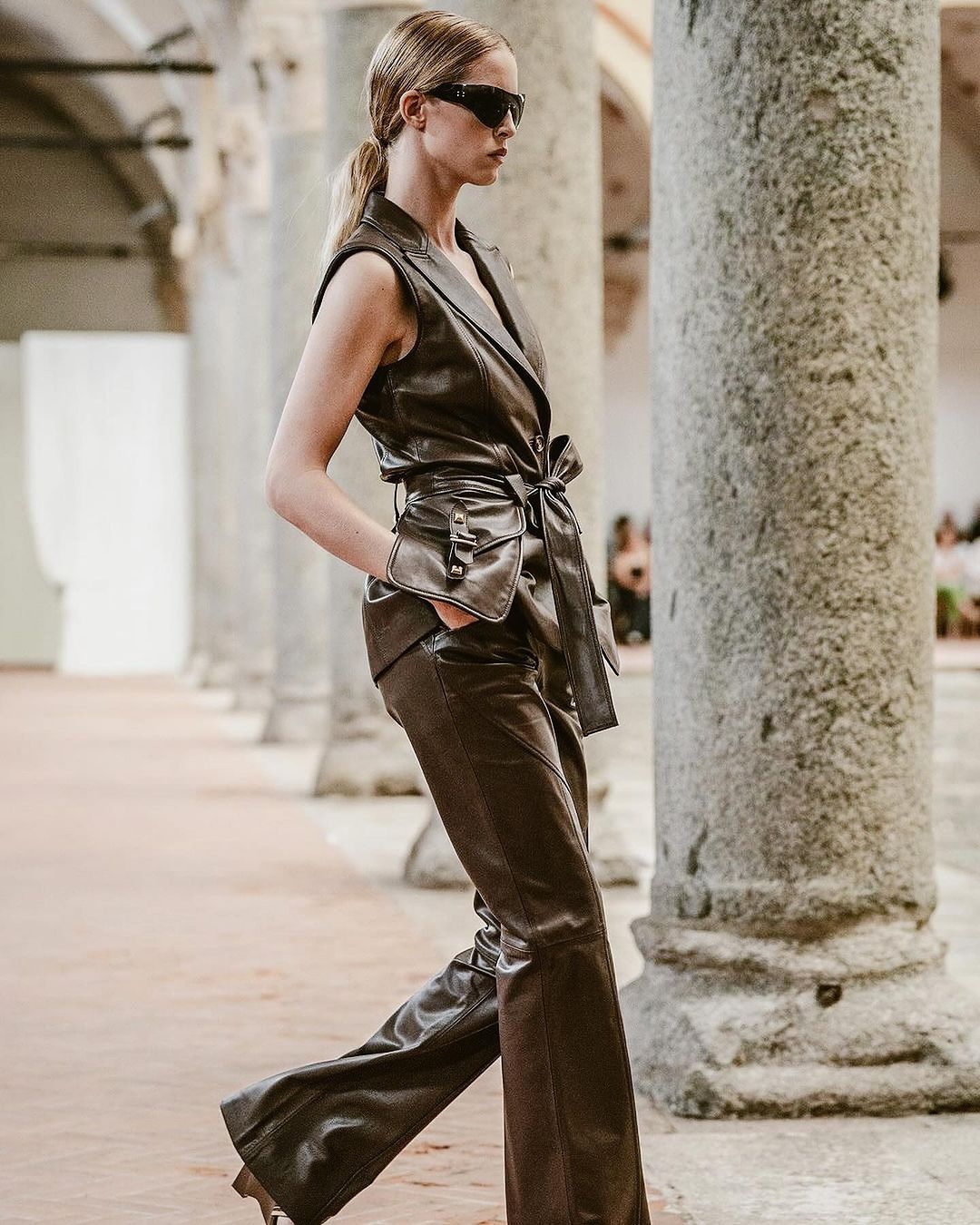 Runway Model in Brown Leather Outfit