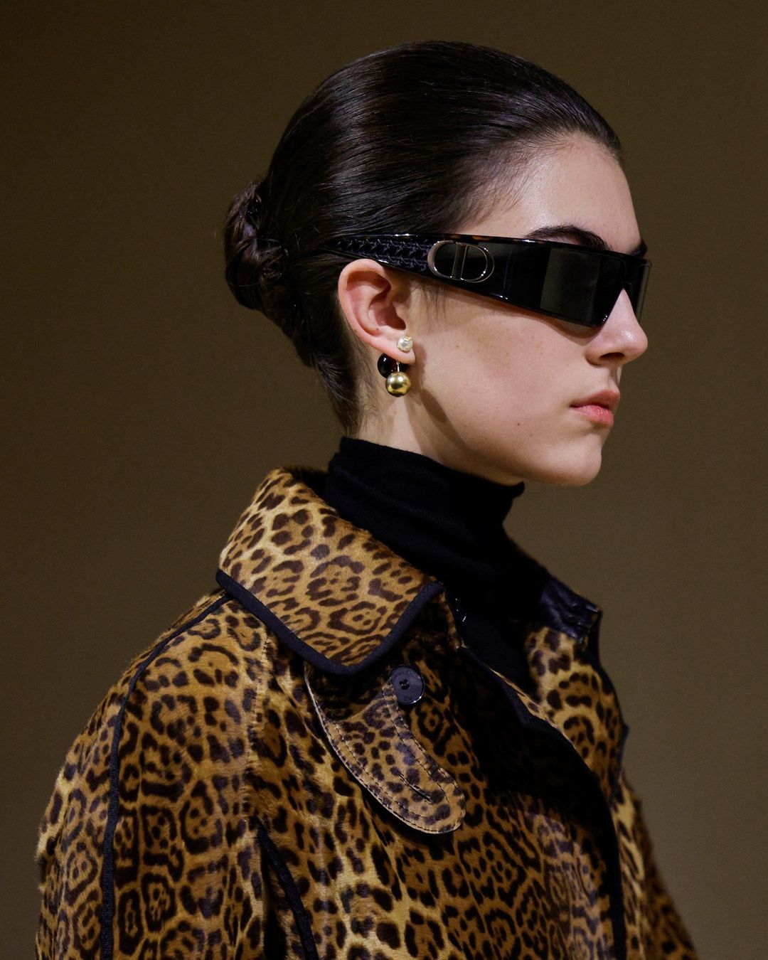 Fashion Model in Leopard Print Outerwear