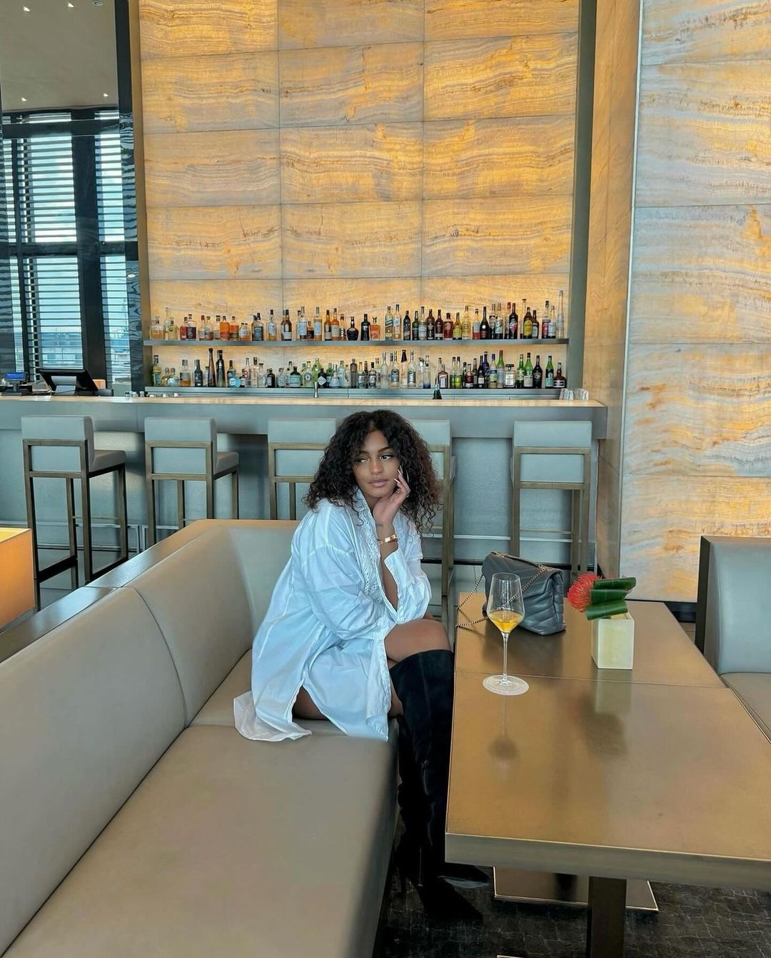 Woman Posing at Modern Bar Lounge