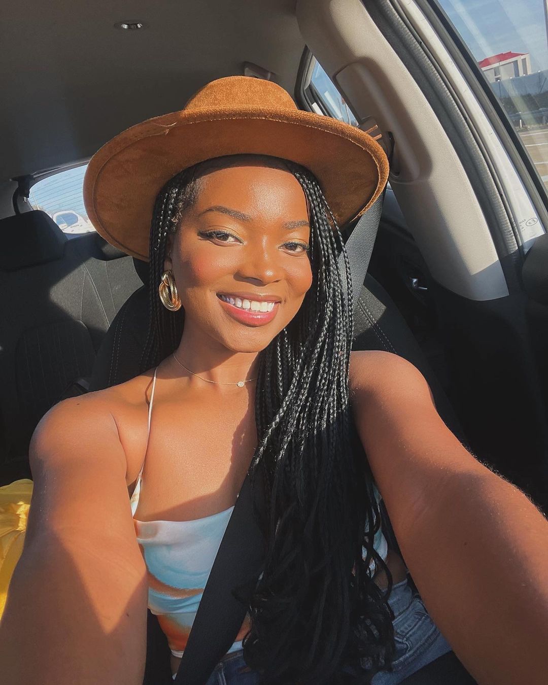 Woman Taking Selfie Inside Car