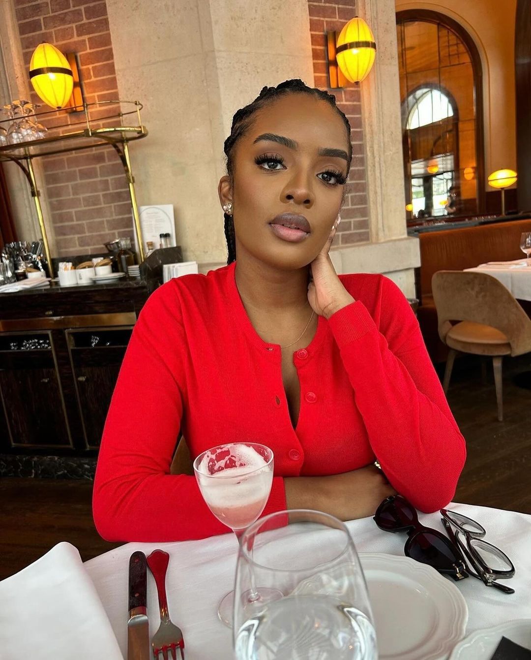 Woman at Restaurant Table