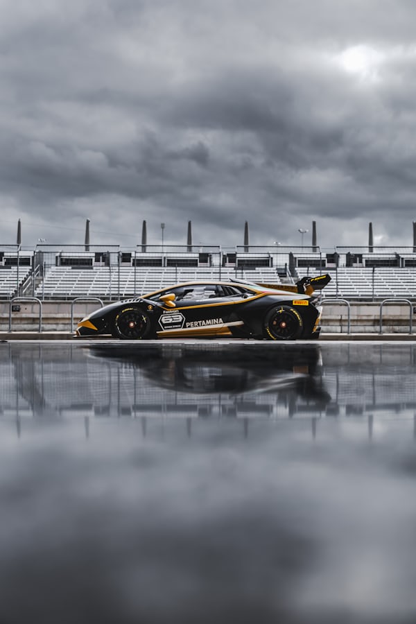 Lamborghini Race Car on Wet Racetrack — Desktop Wallpapers
