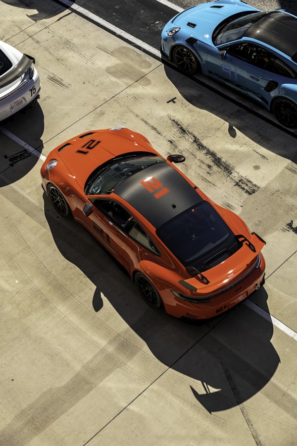 Bright Red Sports Car in Parking Lot