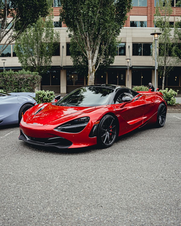 Red McLaren Supercar Parked Outdoors