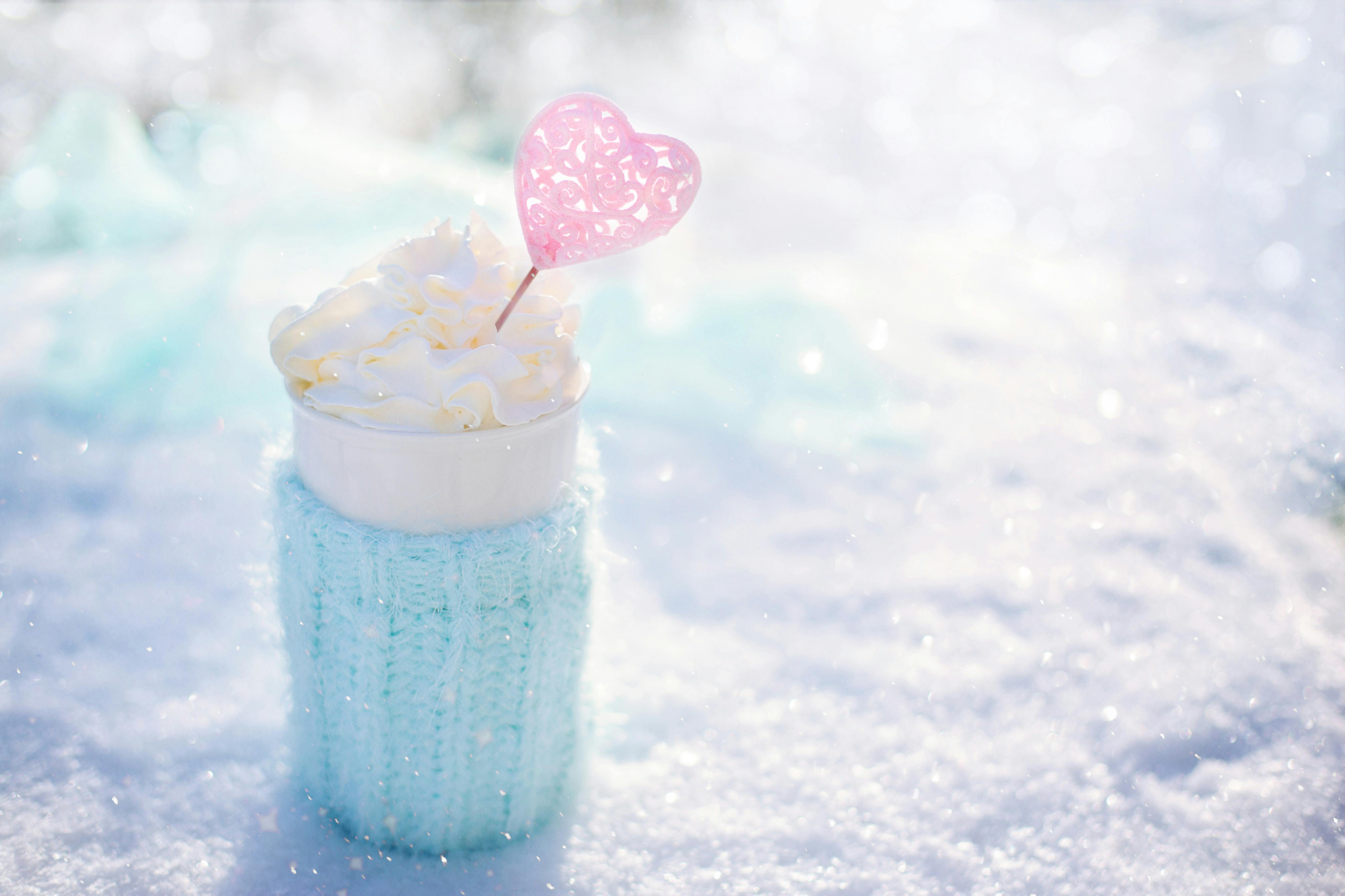 Hot Drink With Heart Topper On Snow