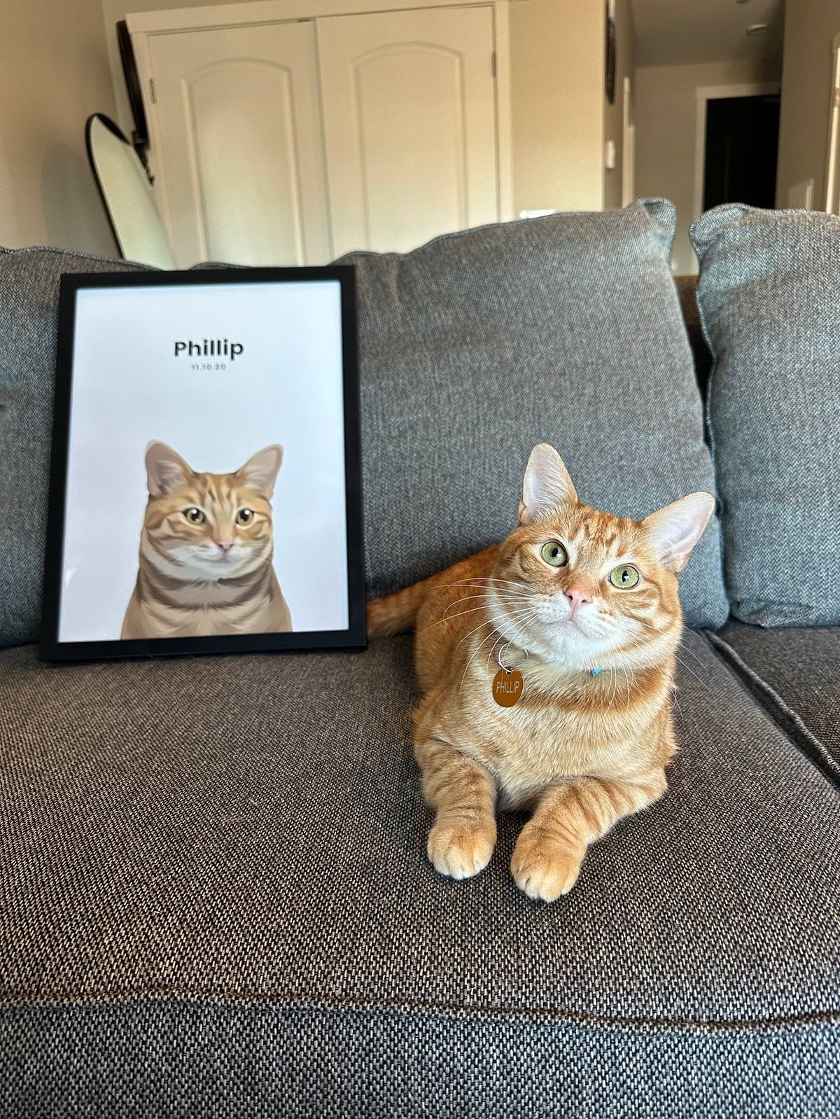 Orange Tabby Phillip With His Portrait