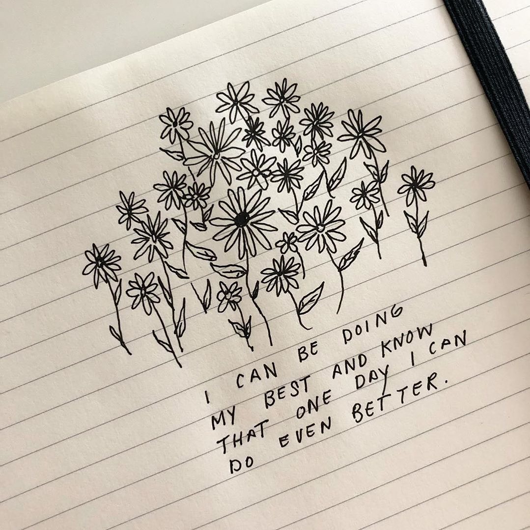 Hand Drawn Flowers and Quote on Notebook