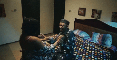 Couple Interacting In Bedroom