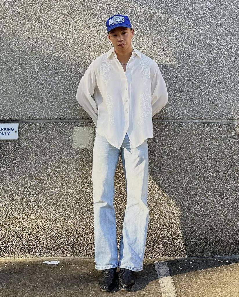 Man Posing in Casual Street Outfit